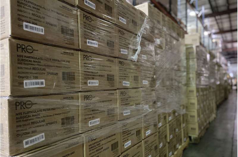 Hospitals still ration medical N95 masks as stockpiles swell