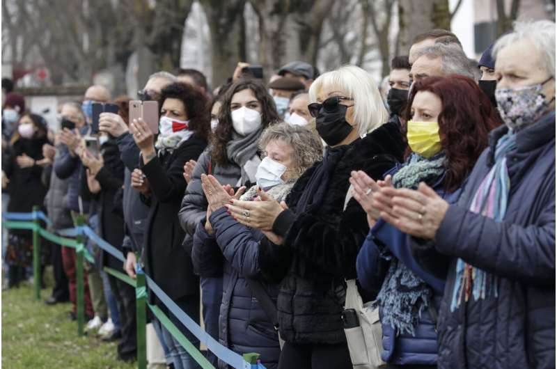With heavy hearts, Italians mark year of COVID-19 outbreak
