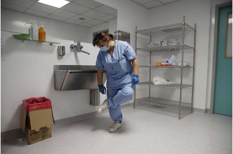 Out of sight, cleaners perform critical work in COVID ICUs