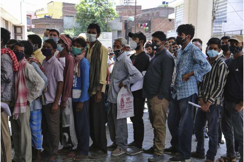 India's capital to lock down amid explosive virus surge