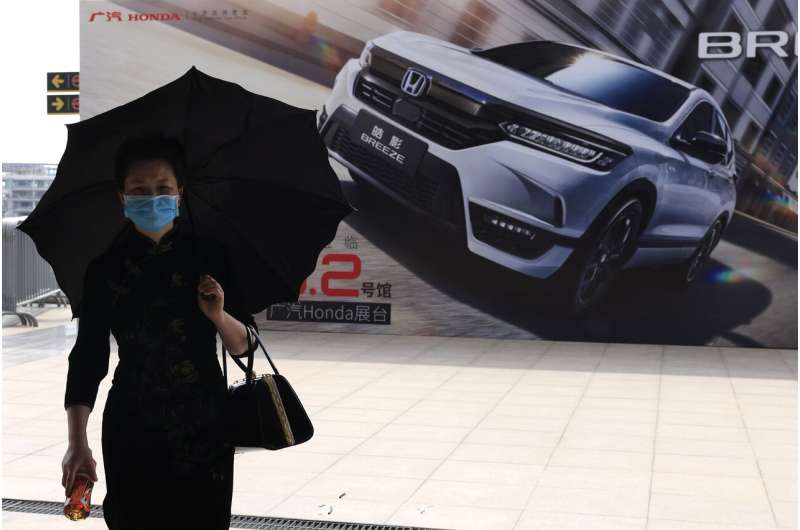 VW, Ford unveil SUVs at China auto show under virus controls