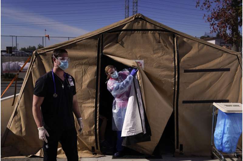 US tops 500,000 virus deaths, matching the toll of 3 wars