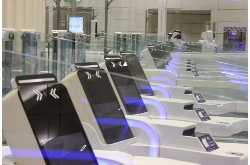 At Dubai airport, travelers' eyes become their passports
