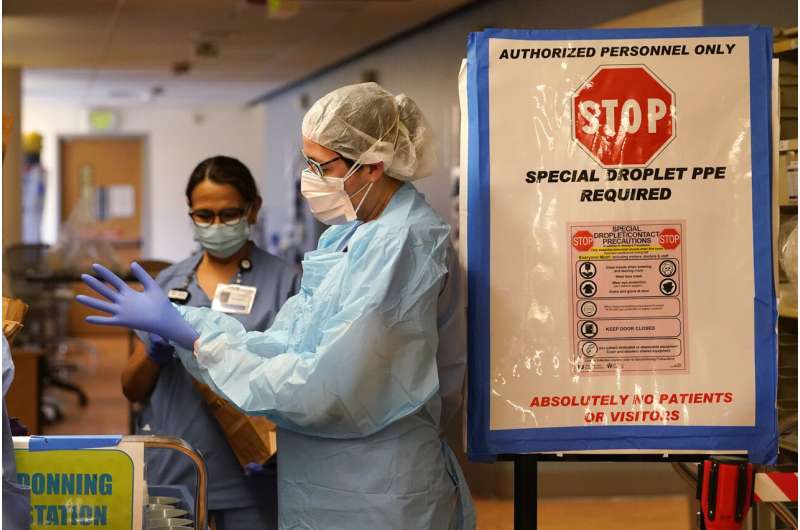 Pandemic's deadliest month in US ends with signs of progress