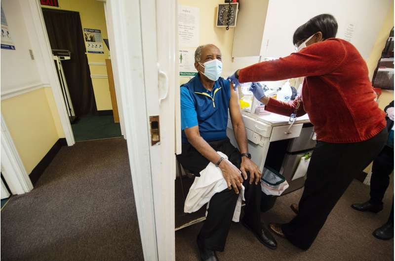 Governors scramble to speed vaccine effort after slow start