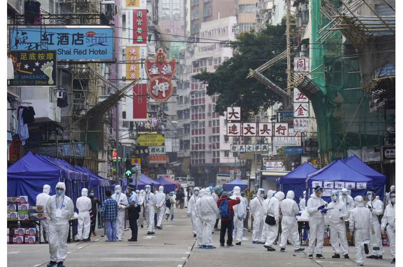 Thousands of Hong Kongers locked down to contain coronavirus
