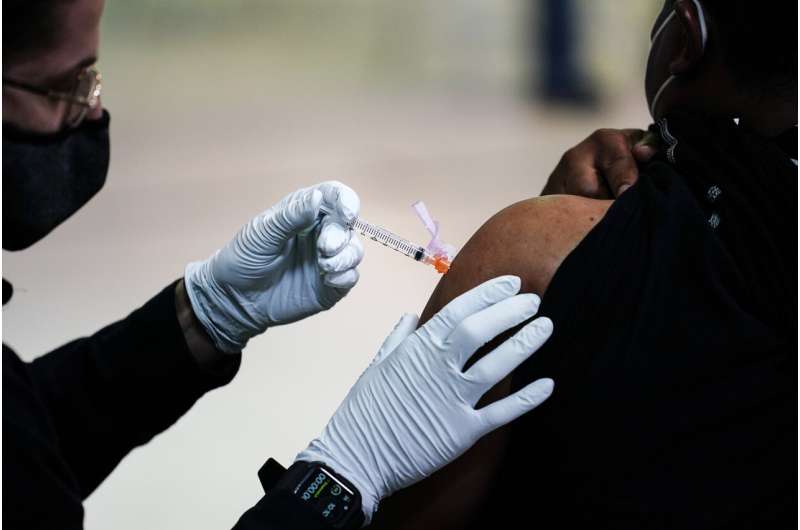 Many still hesitate to get vaccine, but reluctance is easing