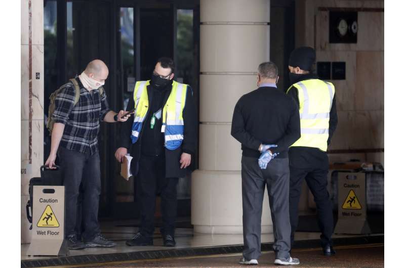 UK opens quarantine hotels, pushes on with vaccine drive