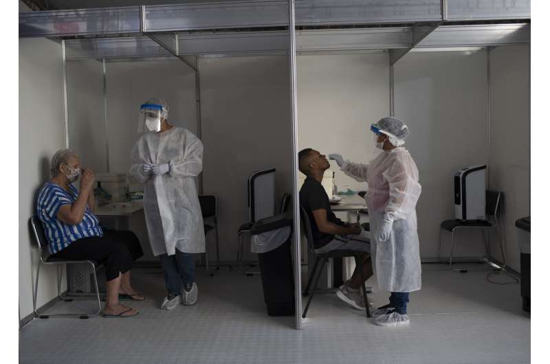 Countries worldwide hit new records for virus cases, deaths
