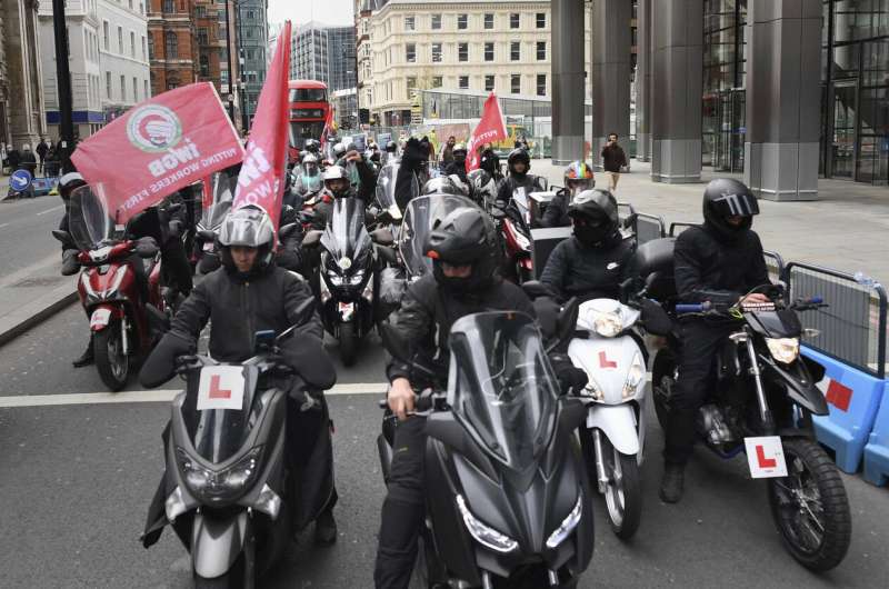 UK Deliveroo riders strike over pay, gig work conditions