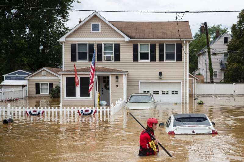 A flash flood caused by Tropical Storm Henri makes landfall, in Helmetta, New Jersey in August 2021