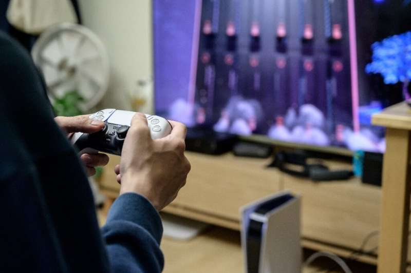 A gamer plays on the new Sony Playstation PS5 at his home in Seoul in November 2020 shortly after the coveted console was launch