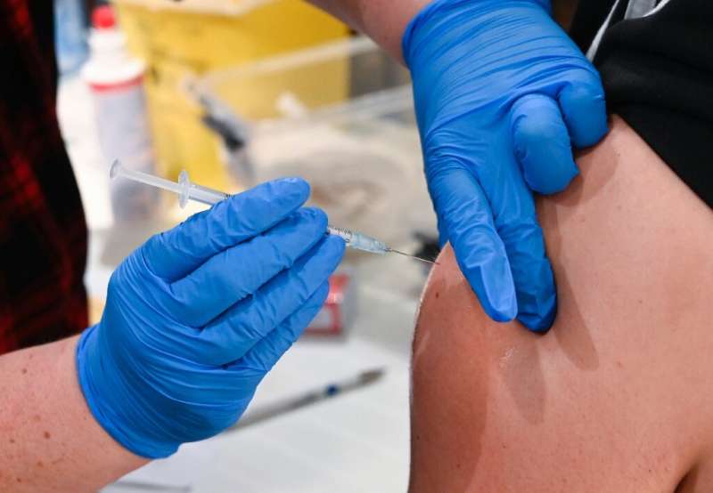A man is vaccinated with the Pfizer BioNTech Covid-19 vaccine in Germany in November 2021