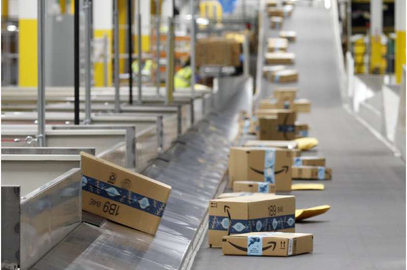 Amazon's profit more than triples as pandemic boom continues