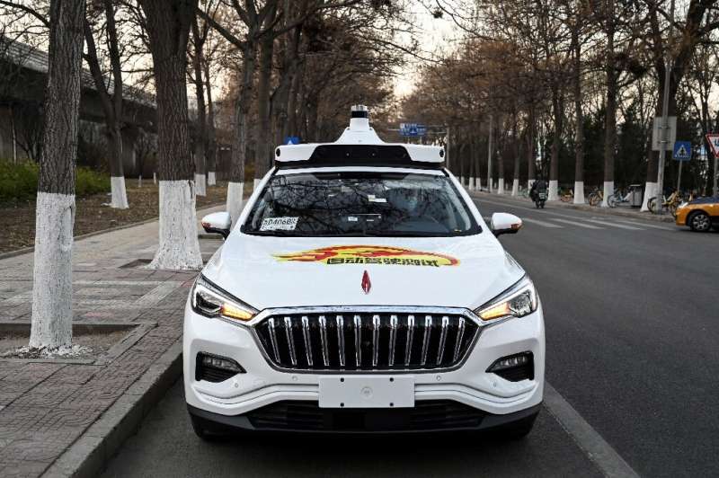 An'Apollo Go' autonomous taxi on a street in Beijing