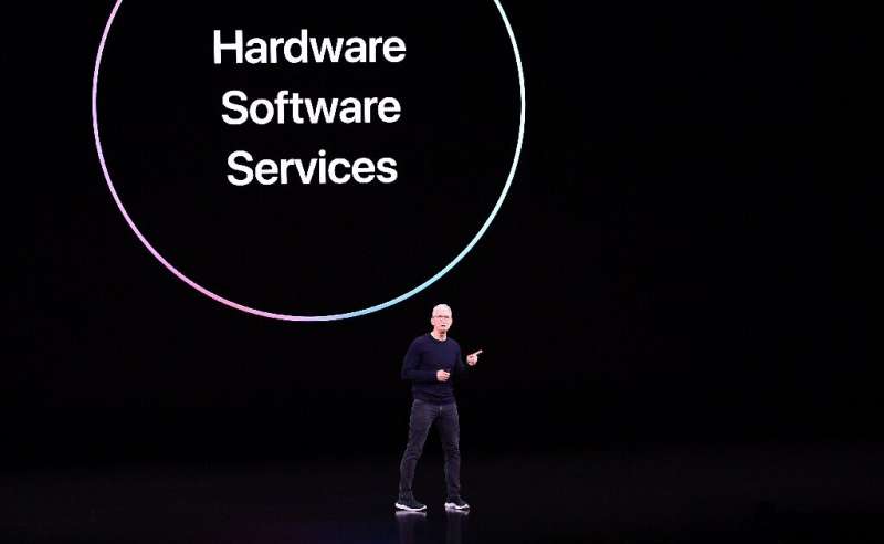 Apple CEO Tim Cook speaks on-stage during a product launch event at Apple's headquarters in Cupertino, California, on September 