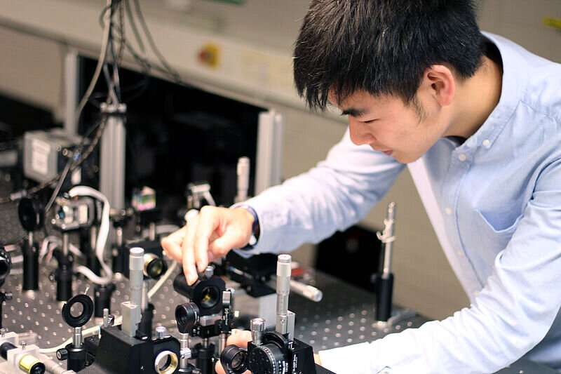 Artificial material protects light states on smallest length scales