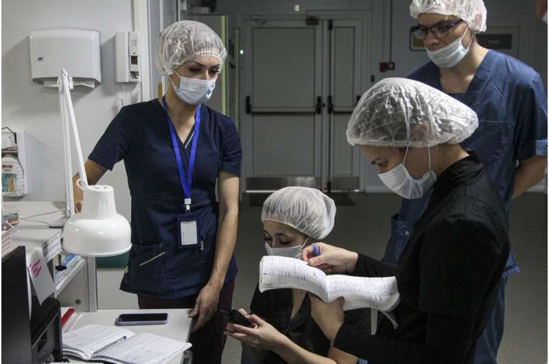 As virus cases rise, so do pleas for Russians to get vaccine