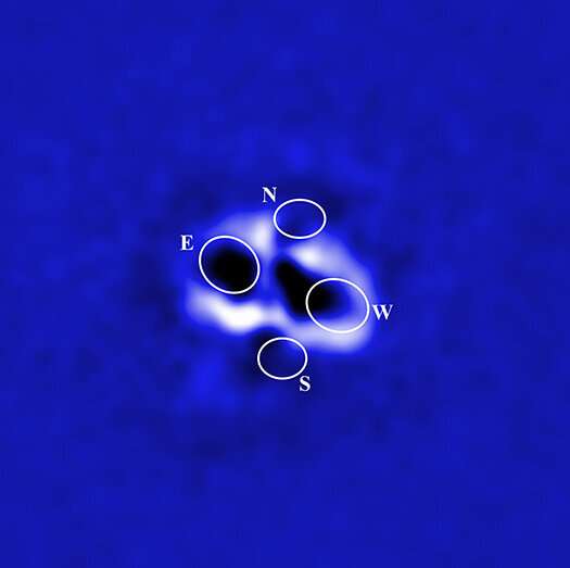Astronomers spy quartet of cavities from giant black holes