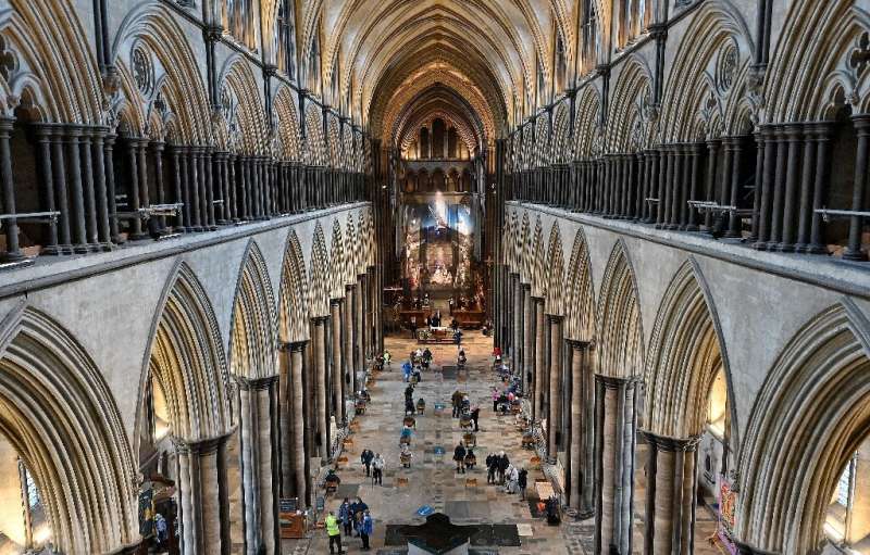 A temporary vaccination centre has been set up inside Salisbury Cathedral in southwest England, with musicians playing the 19th-