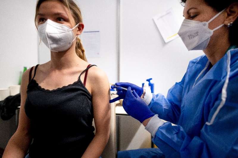 A young woman receives a Covid-19 vaccine in Vienna—European nations have been struggling to speed up vaccination with several n