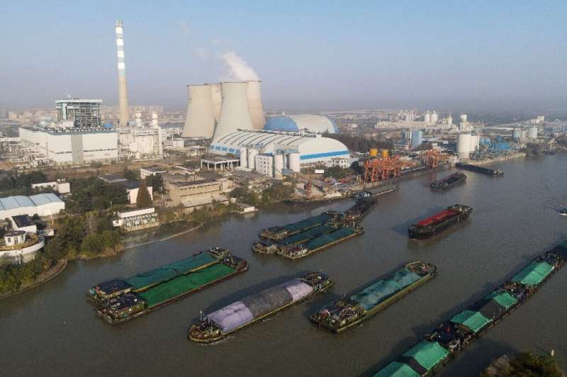 Barges carry coal on the Grand Canal to the Jiangsu Huadian Yangzhou Power Station at Yangzhou, in China's eastern Jiangsu provi