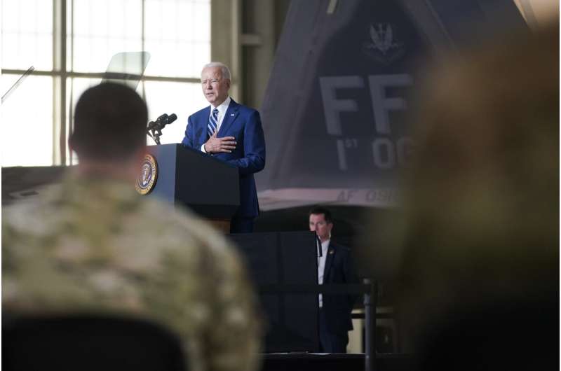 Biden marks vaccine progress, thanks troops ahead of holiday