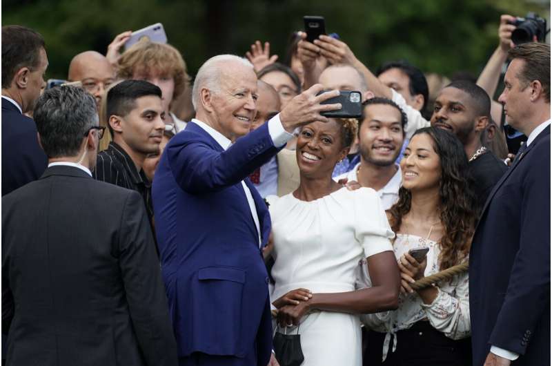 Biden: US 'coming back together,' but COVID not yet finished