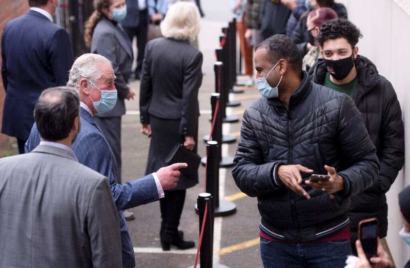 Britain's Prince Charles visits a temporary Covid-19 vaccination centre at Finsbury Park Mosque in east London