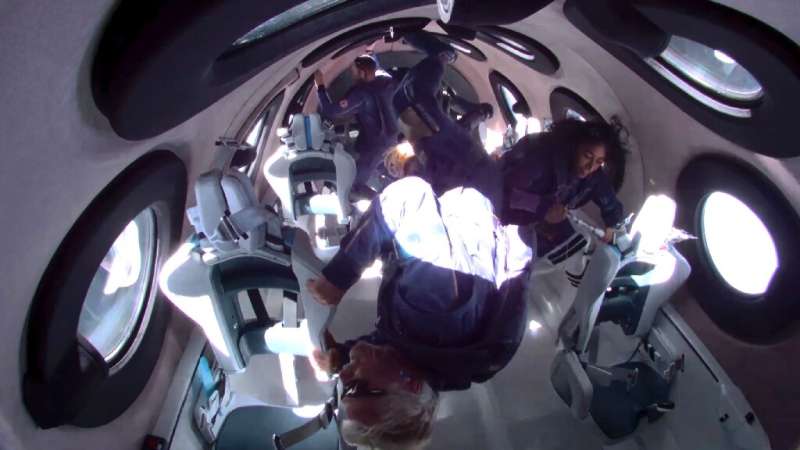 British billionaire Richard Branson experiences weightlessness aboard a Virgin Galactic spacecraft