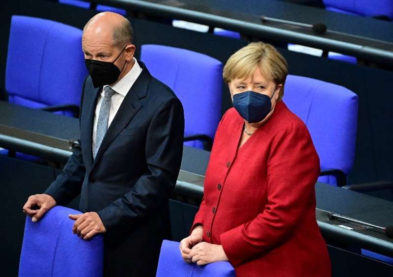 Chancellor Merkel and her designated successor Scholz are in talks to tackle Covid infections in Germany