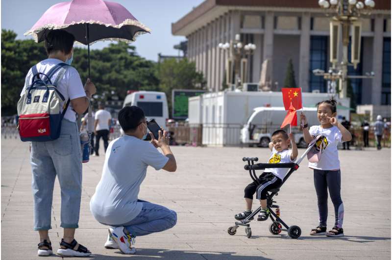 China allows couples third child amid demographic crisis