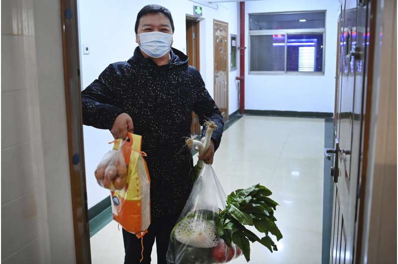 Chinese officials promise groceries for lockdown residents
