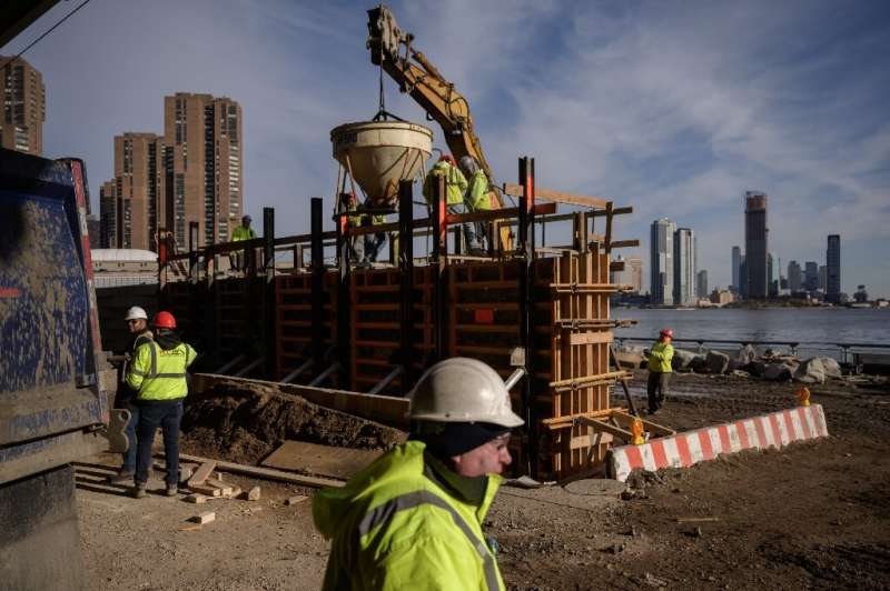 Construction workers on a flood defense project on the east side of Manhattan, New York