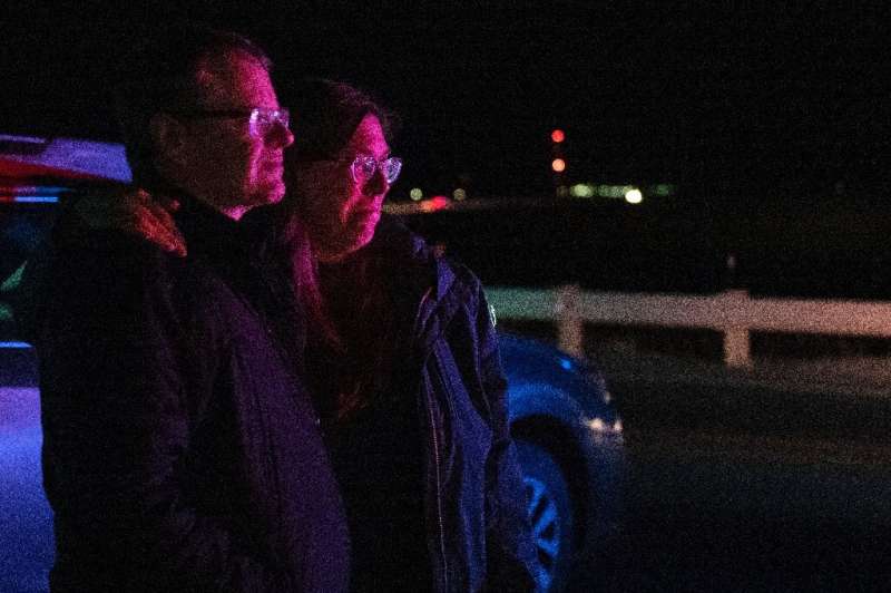 Dr Bonnie Abbott and her husband George watch flames engulf homes as the Marshall Fire spreads in Superior