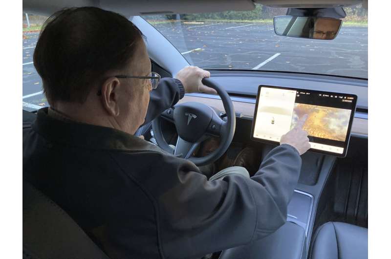 Drivers playing video games? US is looking into Tesla case