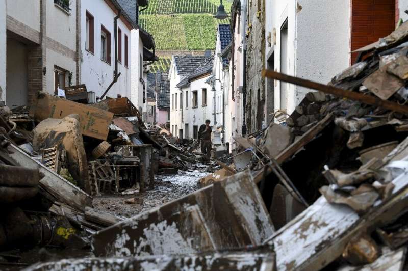 Emergency workers in Germany have been racing to assess damaged buildings, clear debris and restore key services