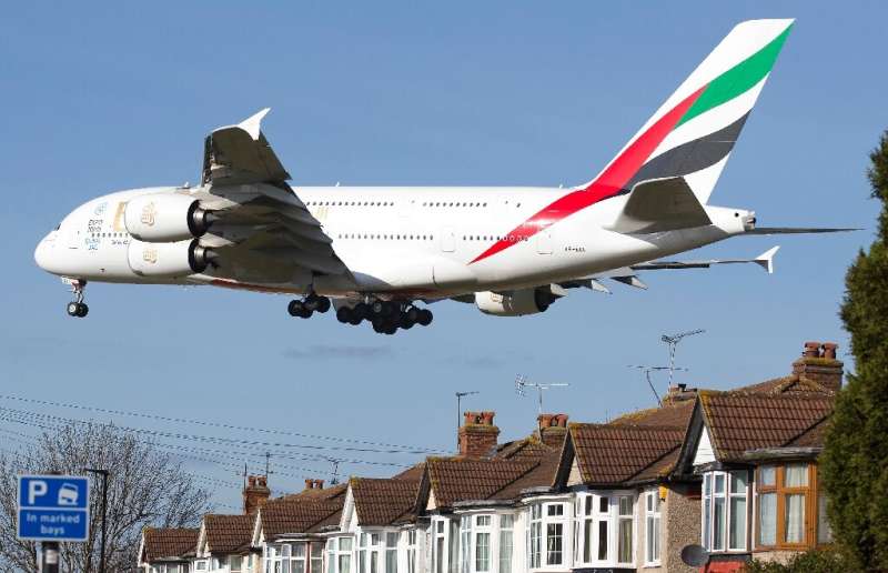 Emirates says there is &quot;still some way to go&quot; before it restores its operations to pre-pandemic levels as it posts a f