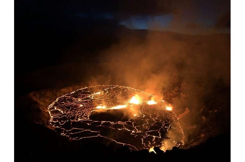 Hawaii's Kilauea Volcano is seen erupting, with fountaining at multiple fissure locations on the base and west wall of the crate