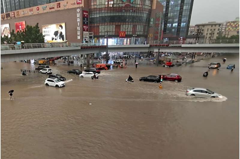 Heavy flooding hits central China; subways inundated