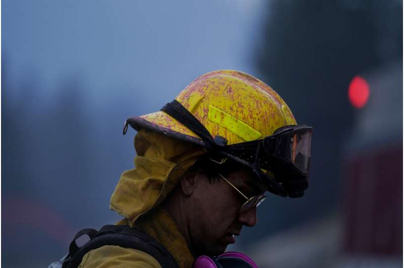 Huge wildfire near Lake Tahoe slows as weather improves