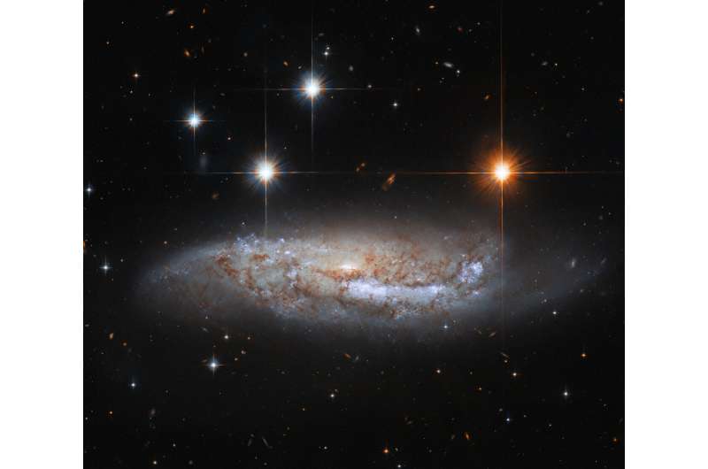 Image: Hubble views a galaxy with an explosive past