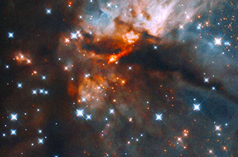 Image: Nebula churns out massive stars in new Hubble image