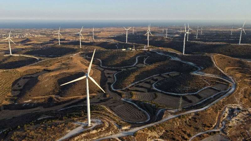 In 2019 just 13.8 percent of Cyprus's power came from solar and wind energy, including the Alexigros wind farm, pictured, near t