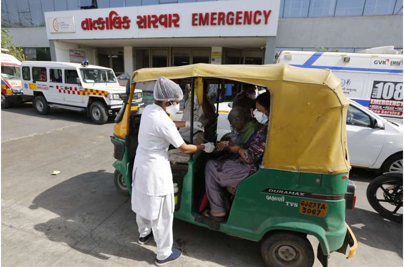 Indian hospitals plead for oxygen, country sets virus record