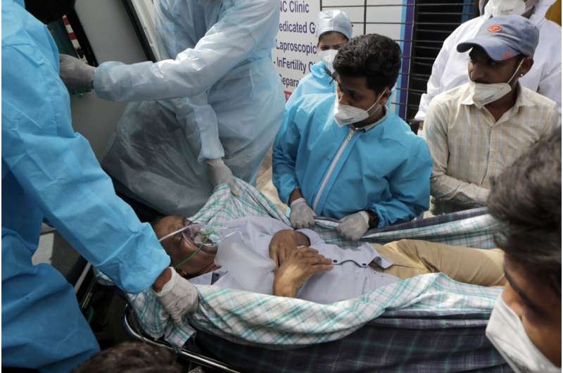 Indian hospitals plead for oxygen, country sets virus record