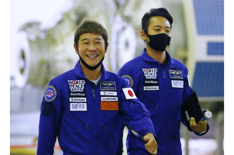 Japanese billionaire Yusaku Maezawa (L) and his assistant Yozo Hirano attended training ahead of the expedition to the Internati