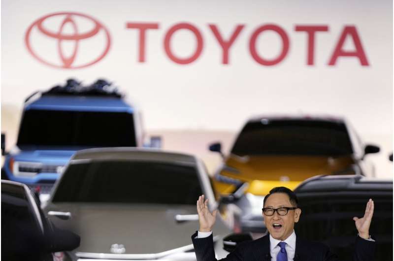 Japan's Toyota promises more electric models, investment