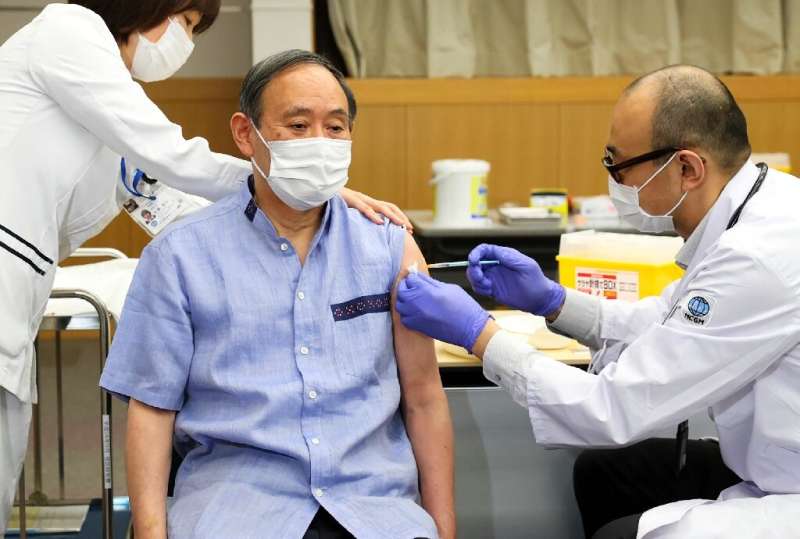 Japan's Prime Minister Yoshihide Suga received his vaccine on Tuesday