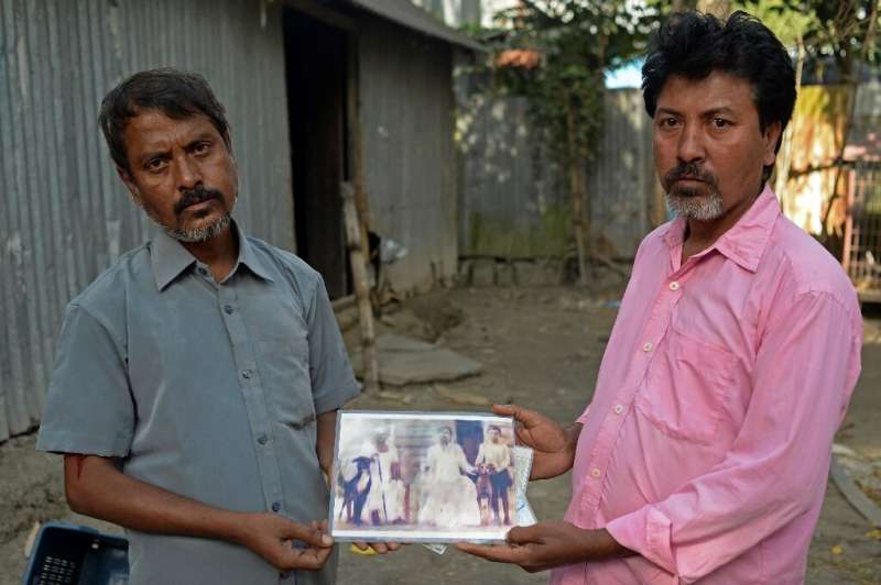 Joton Rabidas (R) and Topon Rabidas are among the last local breeders of the Sarail hound in Bangladesh